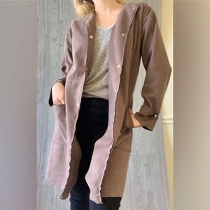 Long Suede jacket with gold button details.